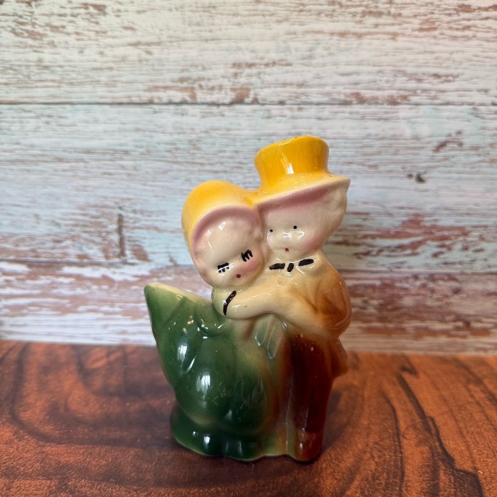 Vintage Shawnee Pottery Boy and Girl Planter green dress yellow hats